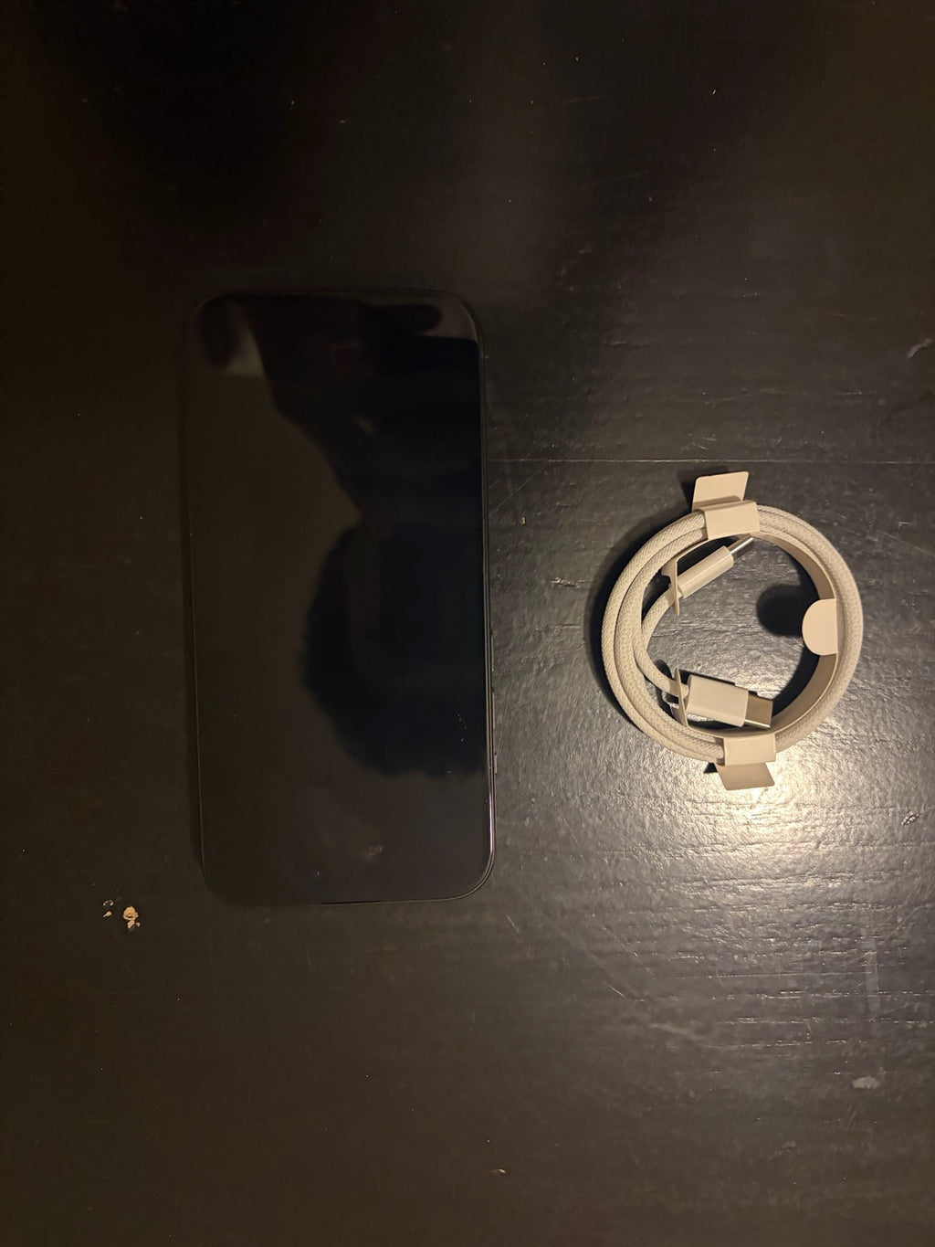 iPhone 15 128GB Black screen off with charging cable